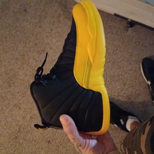 Jordan retro 12s black & gold University.